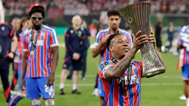 Nathaniel Clyne celebrates with the trophy after winning the Conference League final 