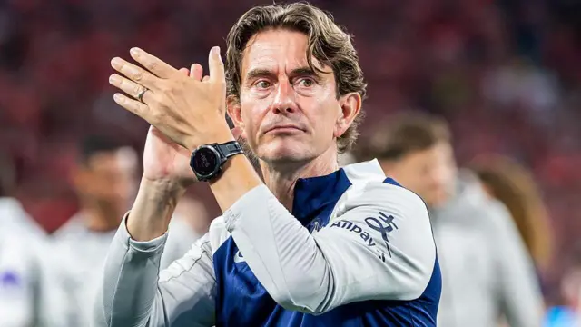 Tottenham Hotspur boss Thomas Frank applauds towards fans