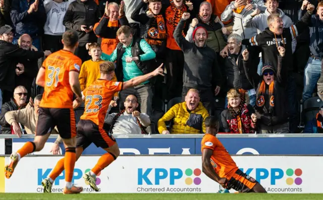 Emmanuel Adegboyega celebrates his match-winning strike