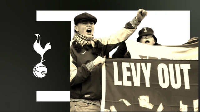 Tottenham fans hold a banner that reads 'Levy Out'.