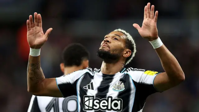 Joelinton celebrates scoring a goal