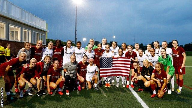 Liverpool Women pose for a photo with the Metropolitan All Stars after their match in Boston
