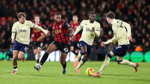 Antoine Semenyo of Bournemouth is closed down by Kiernan Dewsbury-Hall, Tim Iroegbunam and James Garner of Everton