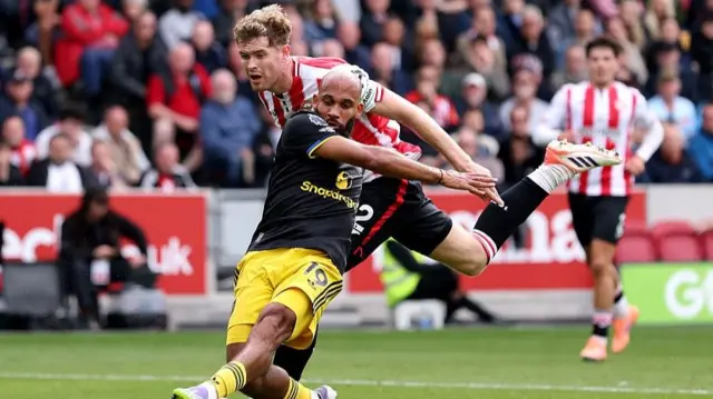 Manchester United striker Bryan Mbeumo is pulled back by Brentford defender Nathan Collins at the Gtech Community Stadium last month