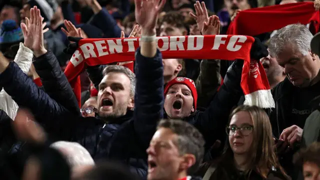 Brentford fans celebrating in the stands
