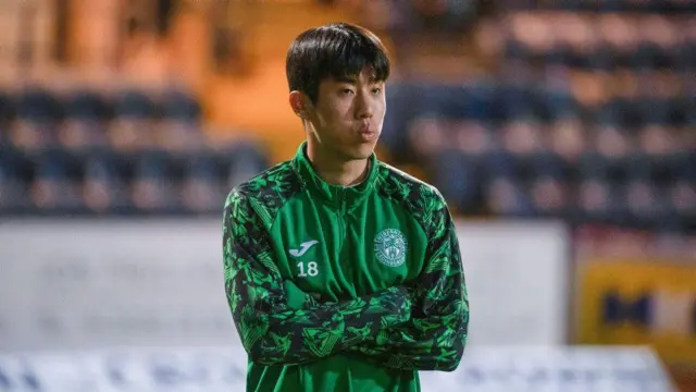 DUNDEE, SCOTLAND - NOVEMBER 23: Hibernian's Kwon Hyeok-kyu during a William Hill Premiership match between Dundee and Hibernian at the Scot Foam Stadium at Den's Park on November 23, 2024, in Dundee, Scotland. (Photo by Euan Cherry / SNS Group)