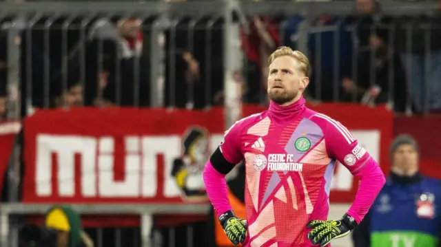  Celtic’s Kasper Schmeichel is dejected during the UEFA Champions League 2024/25 League Knockout Play-off second leg match between FC Bayern Munich and Celtic at the Allianz Arena