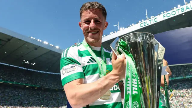 Celtic's Luke McCowan with the trophy during a William Hill Premiership match between Celtic and St Mirren at Celtic Park