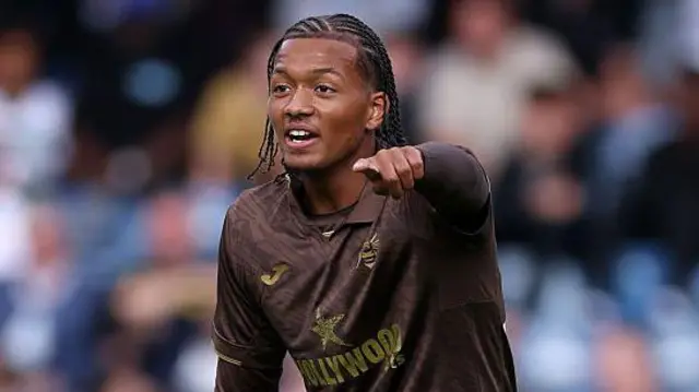 Joshua Stephenson pointing while playing for Brentford B