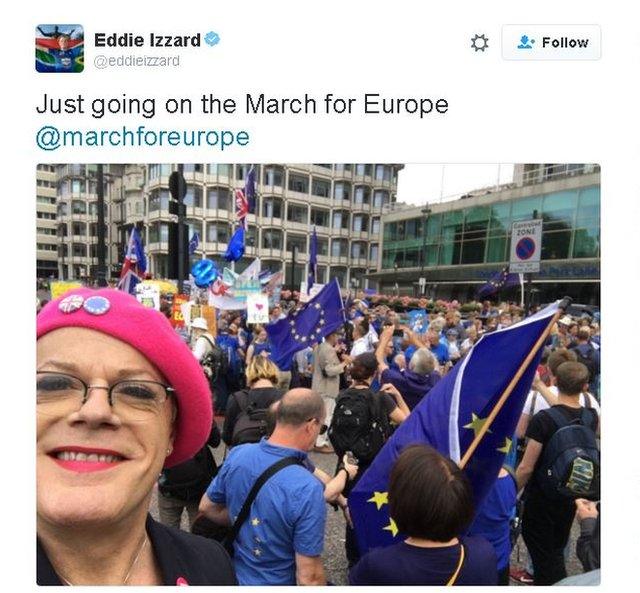 Eddie Izzard twitter picture of himself on the march wearing his trademark pink beret.