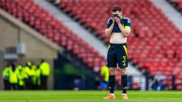 Scotland's Andy Robertson looks dejected