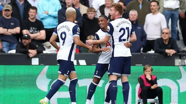 Tottenham players celebrate against West Ham