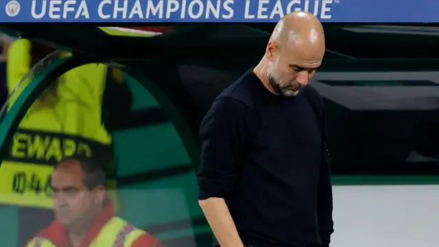 Pep Guardiola looks dejected