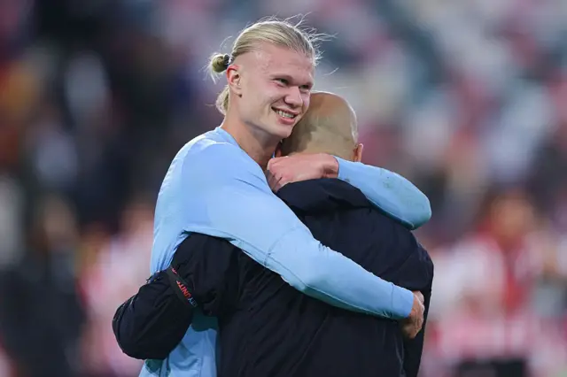 Erling Haaland hugs Pep Guardiola after win over Brentford in Premier League