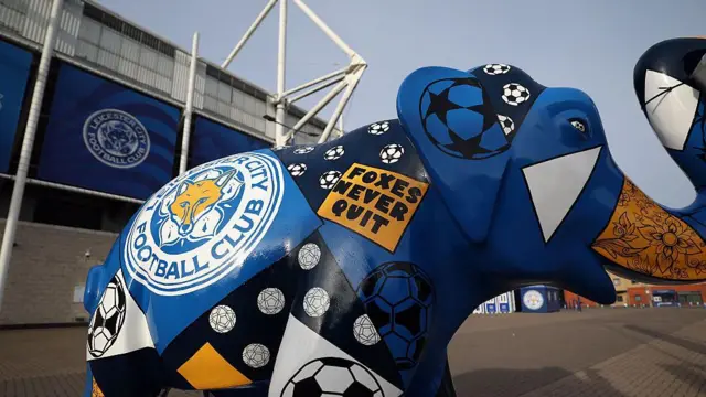 A statue of an elephant outside Leicester City's stadium painted in the club's colours and crest