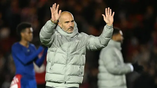 Enzo Maresca acknowledges the Chelsea fans after full-time
