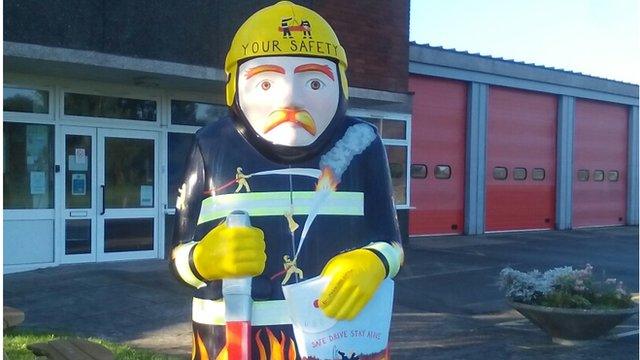 A fireman Baron's Trail sculpture, outside the fire station