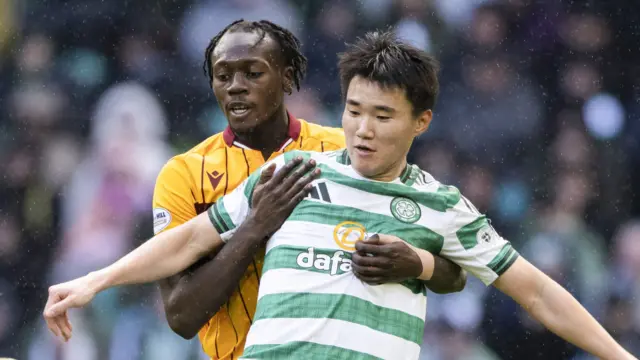 Motherwell's Emmanuel Longelo and Celtic’s Hyunjun Yang