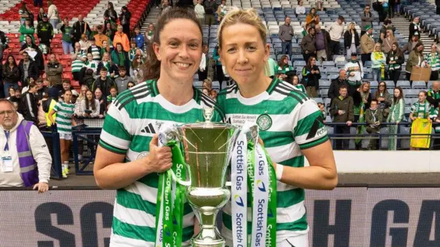 Celtic's Kelly Clark and Chloe Craig (right) lift the Scottish Cup at Hampden