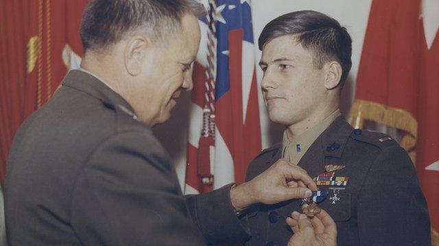 Marine receiving Navy Cross in ceremony