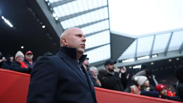 Arne Slot looks out at Anfield