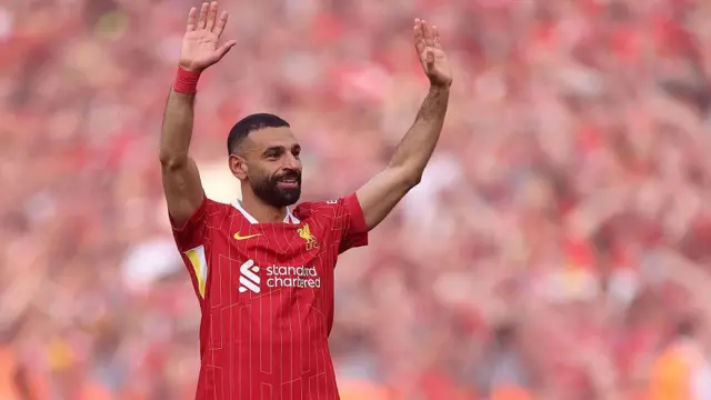 Salah at Anfield after wrapping up the title. 