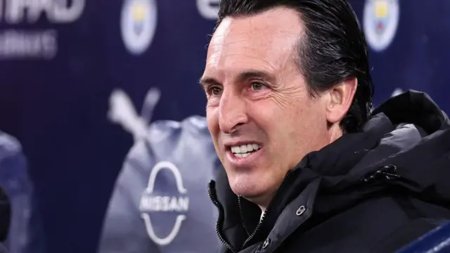 Unai Emery sits in the dugout