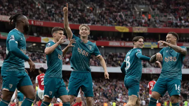 Bournemouth players celebrate a goal at Arsenal in 2025