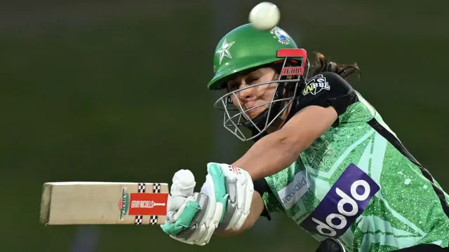 Maia Bouchier plays a shot