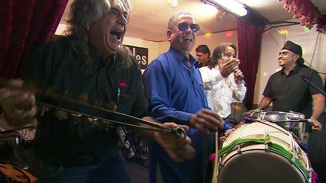 Pub musicians in a desi, or Indian pub