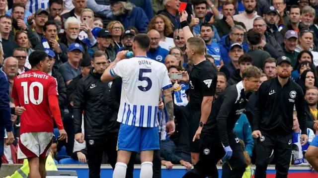 Morgan Gibbs-White is sent off by referee Rob Jones at Brighton