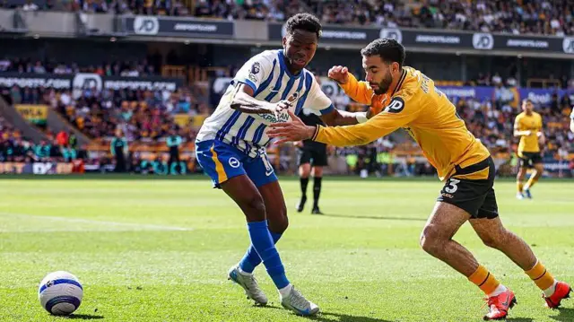  Simon Adingra and Rayan Ait-Nouri battling for possession