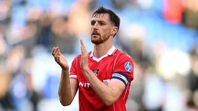 Dominic Hyam captaining Wrexham