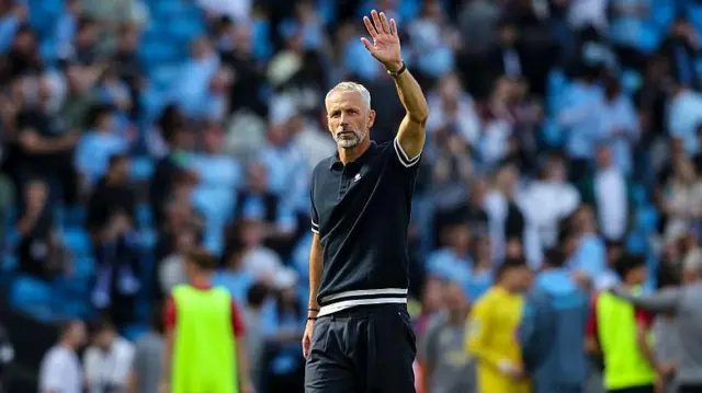 Marco Rose waves to the Bournemouth fans
