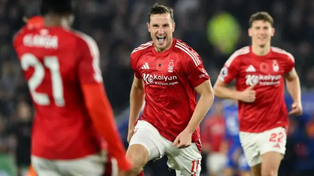 Chris Wood celebrates with his teammates