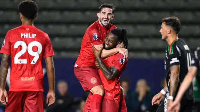 Bournemouth goal scorer Antoine Semenyo with Lewis Cook