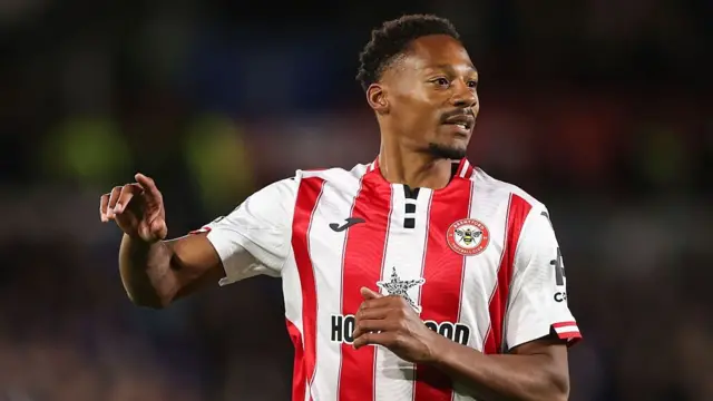 Brentford's Ethan Pinnock signals to his team-mates