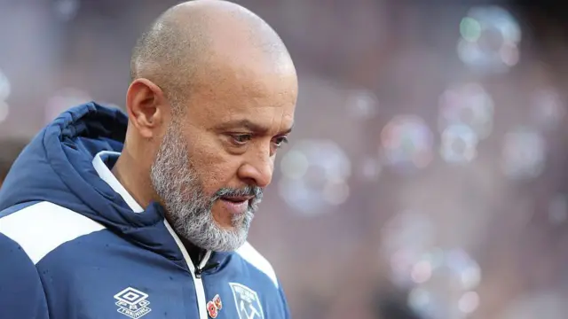 Nuno espirito Santo looking at the ground