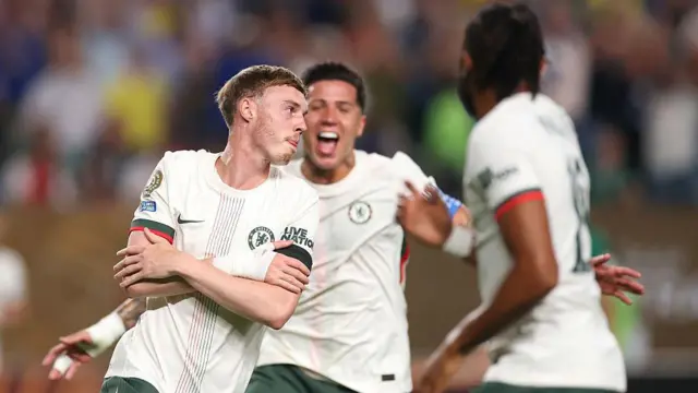 Cole Palmer, Enzo Fernandez and Christopher Nkunku celebrate a Chelsea goal