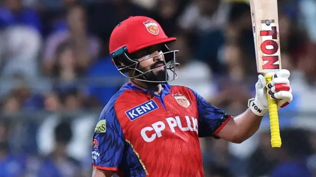 Punjab Kings' Prabhsimran Singh celebrates after reaching his half-century