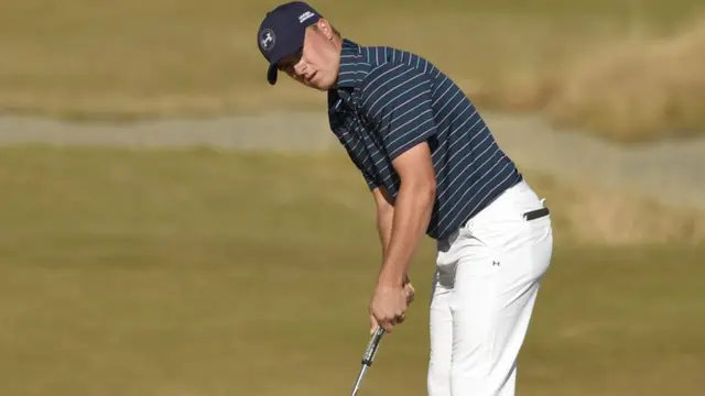 Jordan Spieth with his putter