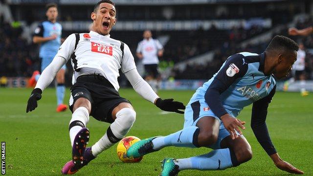 Derby's Tom Ince is fouled by Rotherham defender Darnell Fisher