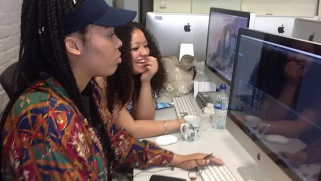 Trainees at a computer