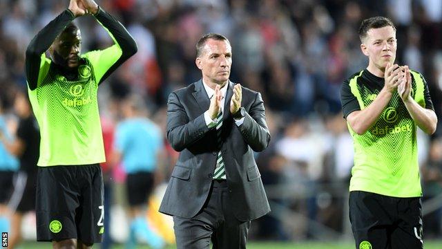 Olivier Ntcham, Brendan Rodgers and Callum McGregor applaud Celtic fans in Lithuania