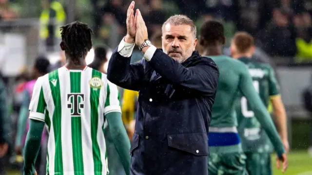 Ange Postecoglou applauds after win