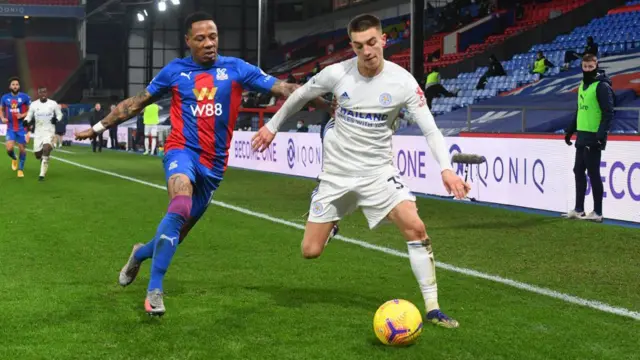 Luke Thomas of Leicester City is challenged by Nathaniel Clyne of Crystal Palace during the Premier League match between Crystal Palace and Leicester City at Selhurst Park on December 28, 2020