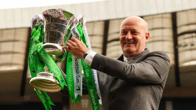 Grant Scott celebrates with the Women's Scottish Cup