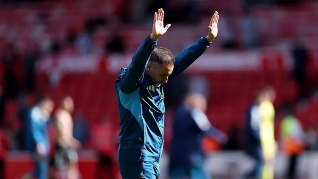 Vitor Pereira, Manager of Nottingham Forest, acknowledges the fans