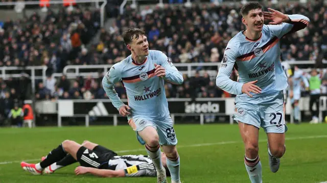 Vitaly Janelt wheels away after scoring for Brentford against Newcastle