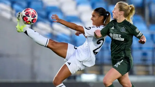 Celtic's Murphy Agnew challenges for the ball against Real Madrid